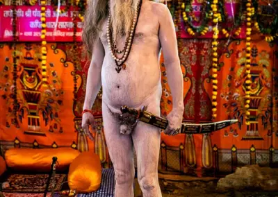 A Naga Sadhu standing in his akhara before the Sahi Snan at Kumbh Mela, Allahabad.