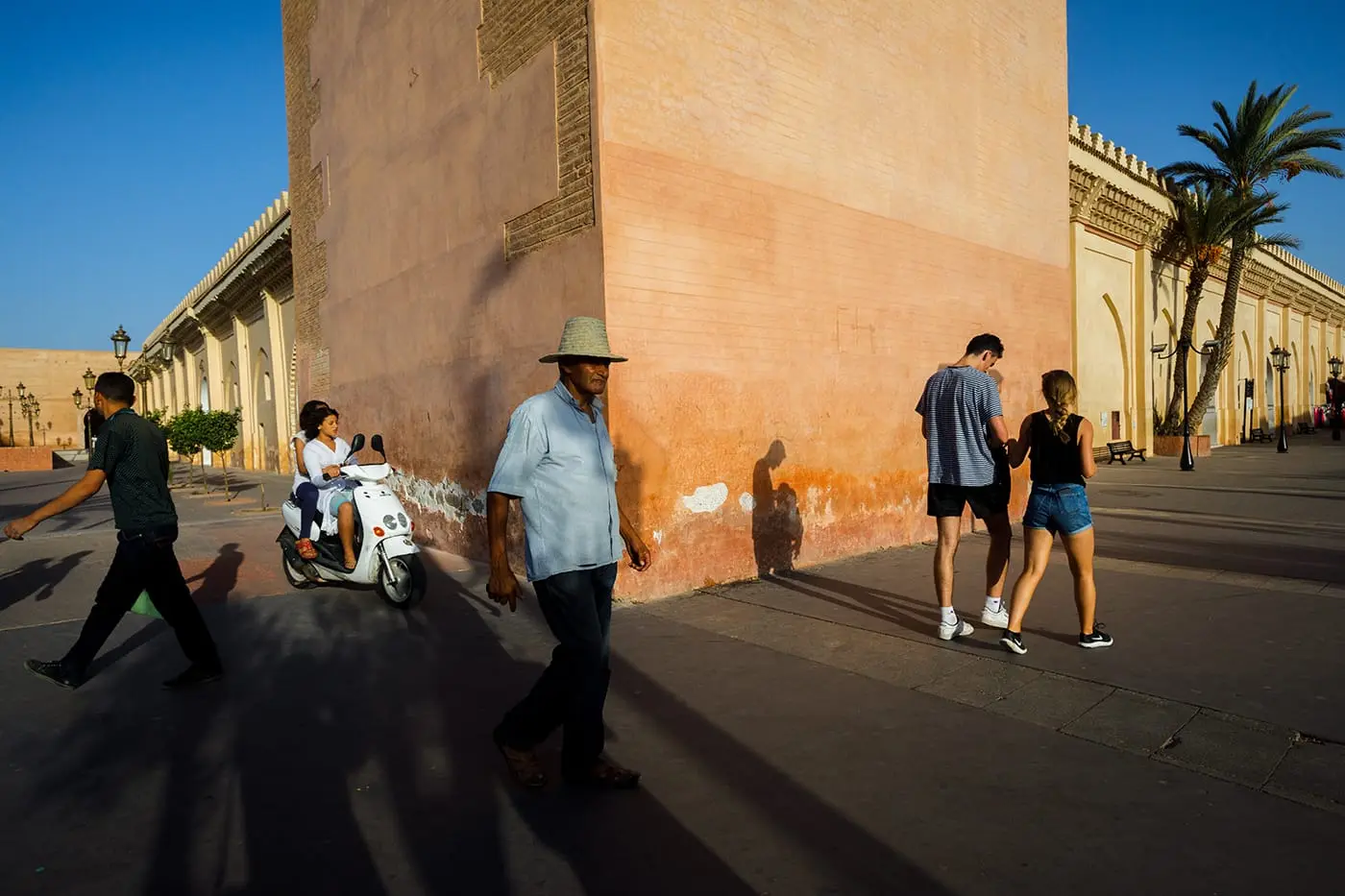 Street life in front of Moulay El Yazid Mosque, Marrakesh, Morocco.