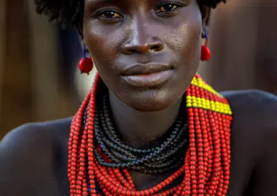 A Daasanach lady sitting infront of her house in the Omo Valley, Ethiopia.